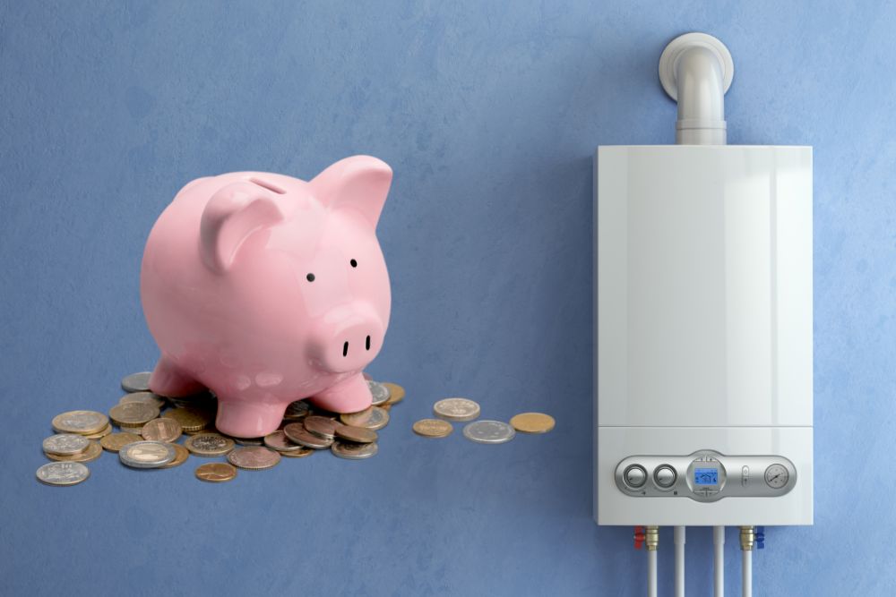 Gas water heater next to a piggy bank with coins